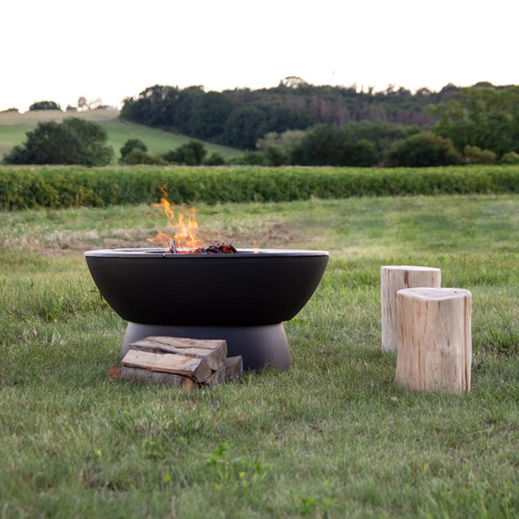Meteor 38” Cast Iron Fire Pit with Low Base, Grill Grates, Griddle, and Soapstone Surfaces