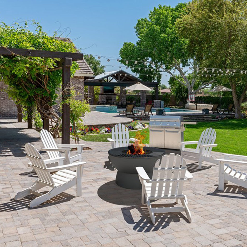 Meteor 38” Cast Iron Fire Pit with Low Base, Grill Grates, Griddle, and Soapstone Surfaces