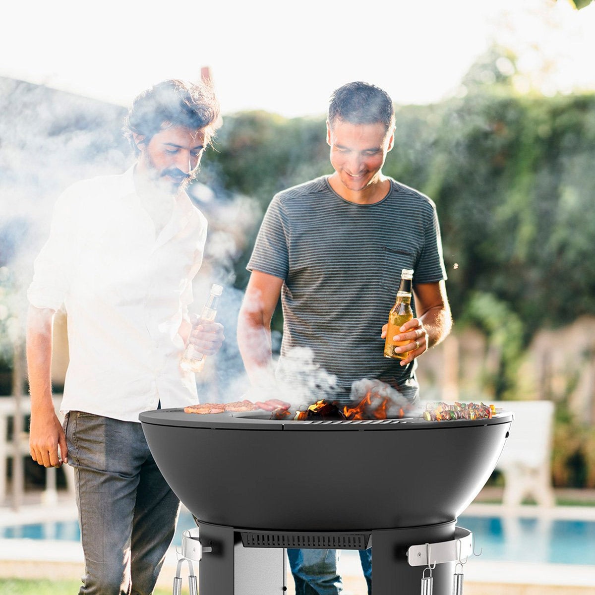 Zenith 38” Cast Iron Fire Pit with Standing Base, Grill Grate, Griddle, and Soapstone Surfaces