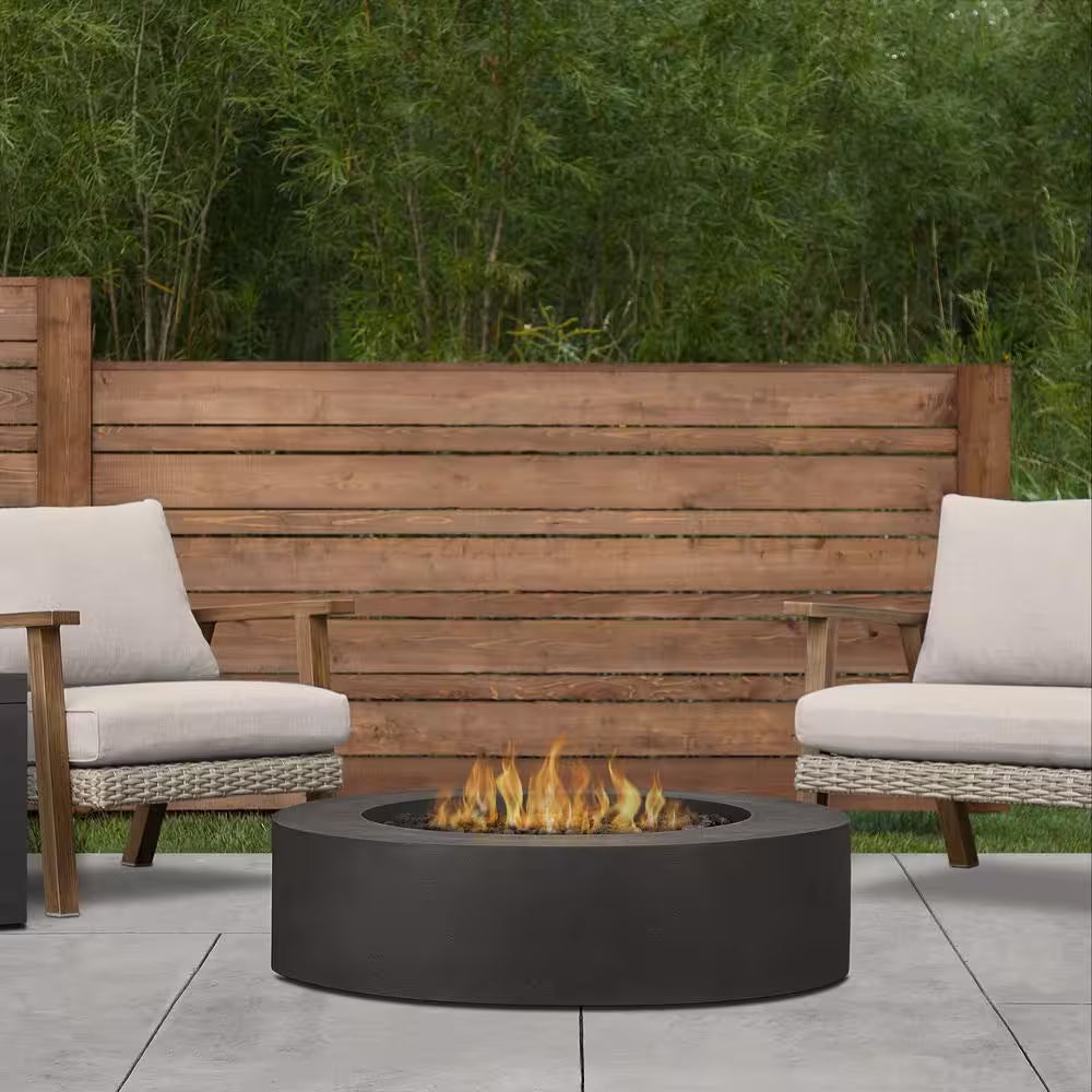 Jensen Co. Brookhurst 43 In. W X 13 In. H round Outdoor GFRC Liquid Propane Fire Pit in Carbon with Lava Rocks